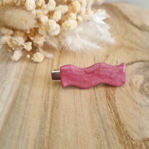 Barrette à cheveux ondulée rose framboise pailletée