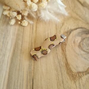 Barrette à cheveux ondulée beige effet léopard avec éclats dorés