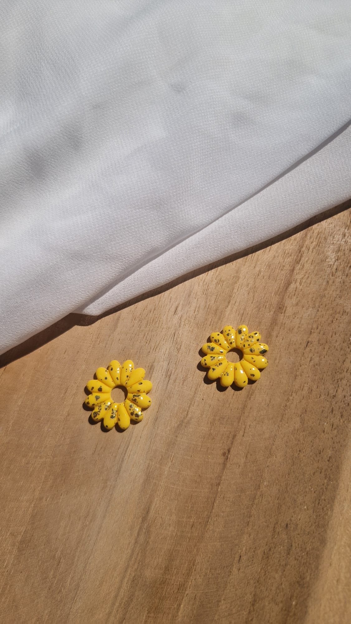 Pampilles interchangeables Marguerite Soleil Pampilles interchangeables Marguerite Soleil en forme de fleur jaune
